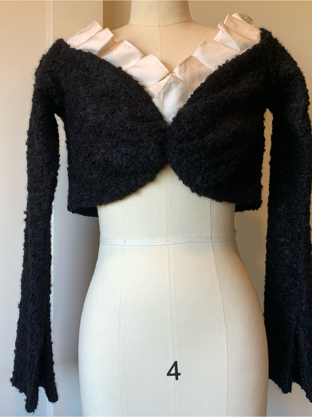 Aaizél Black Bouclé Cropped Shrug with White Ruffle Trim